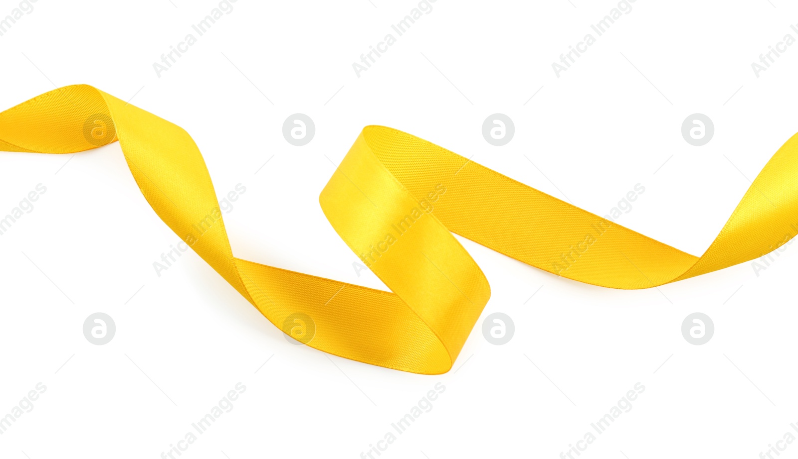 Photo of One beautiful yellow ribbon isolated on white, top view