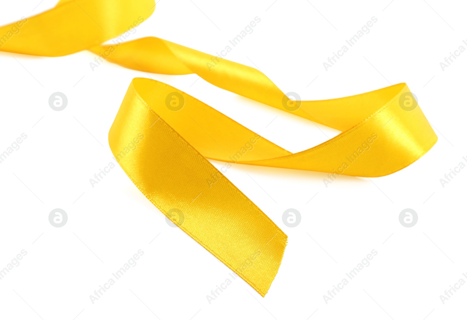 Photo of One beautiful yellow ribbon isolated on white