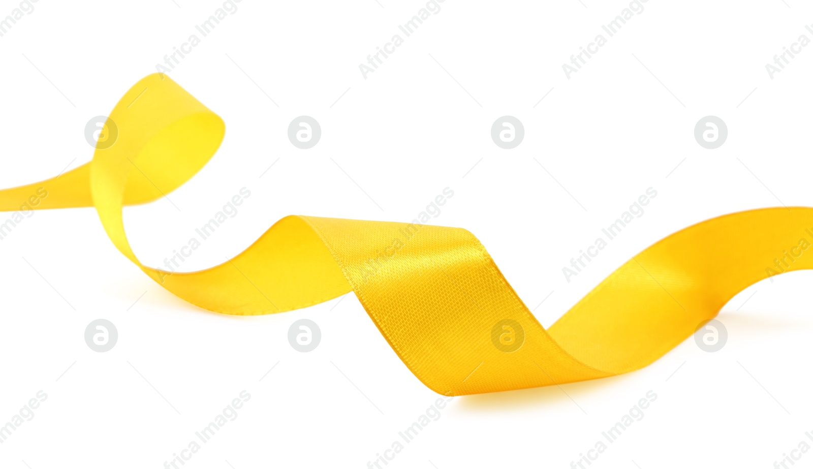 Photo of One beautiful yellow ribbon isolated on white