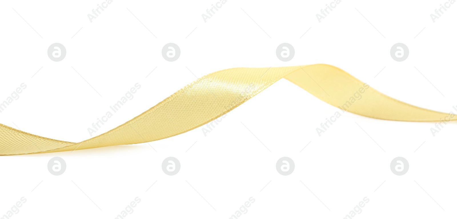 Photo of One beautiful light yellow ribbon isolated on white