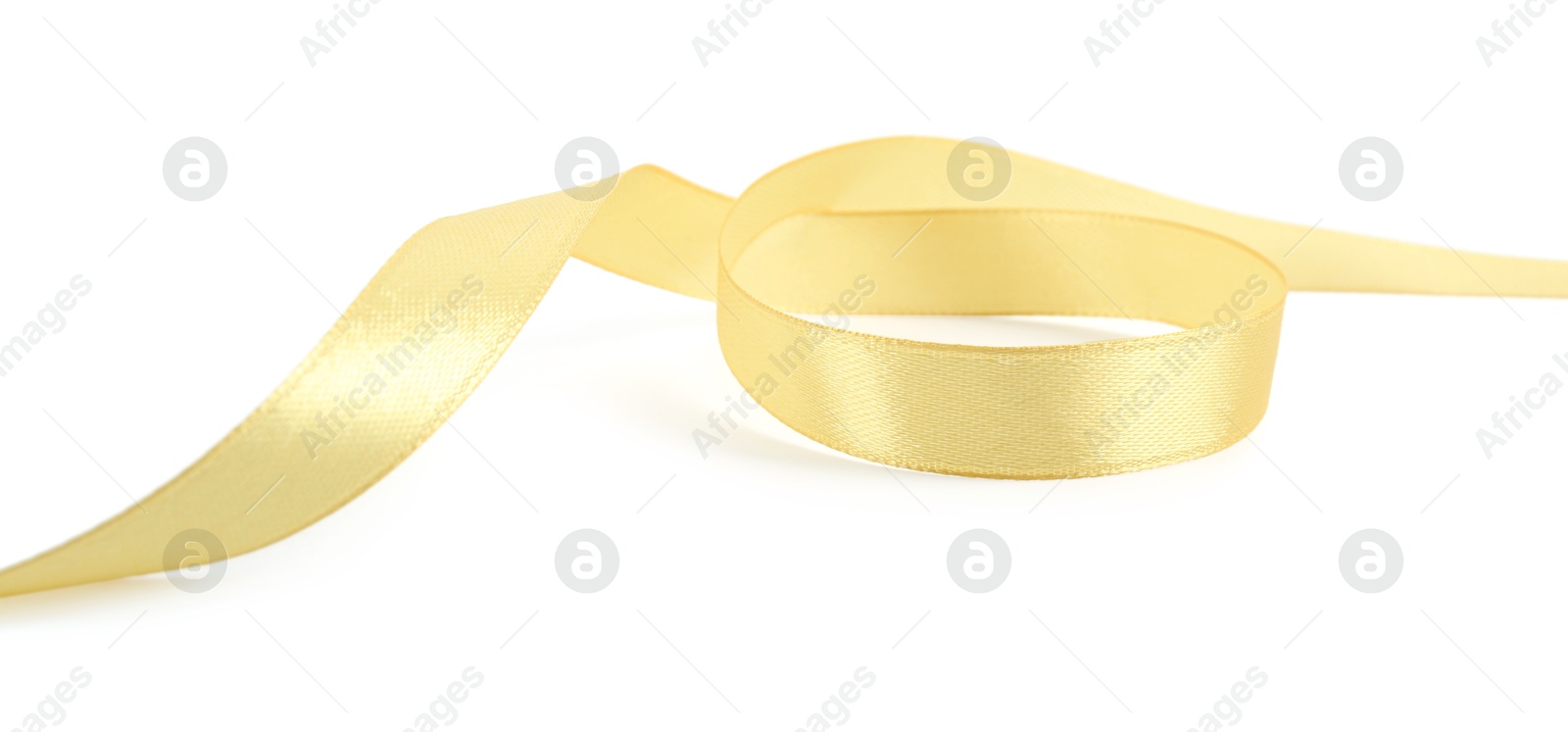 Photo of One beautiful light yellow ribbon isolated on white