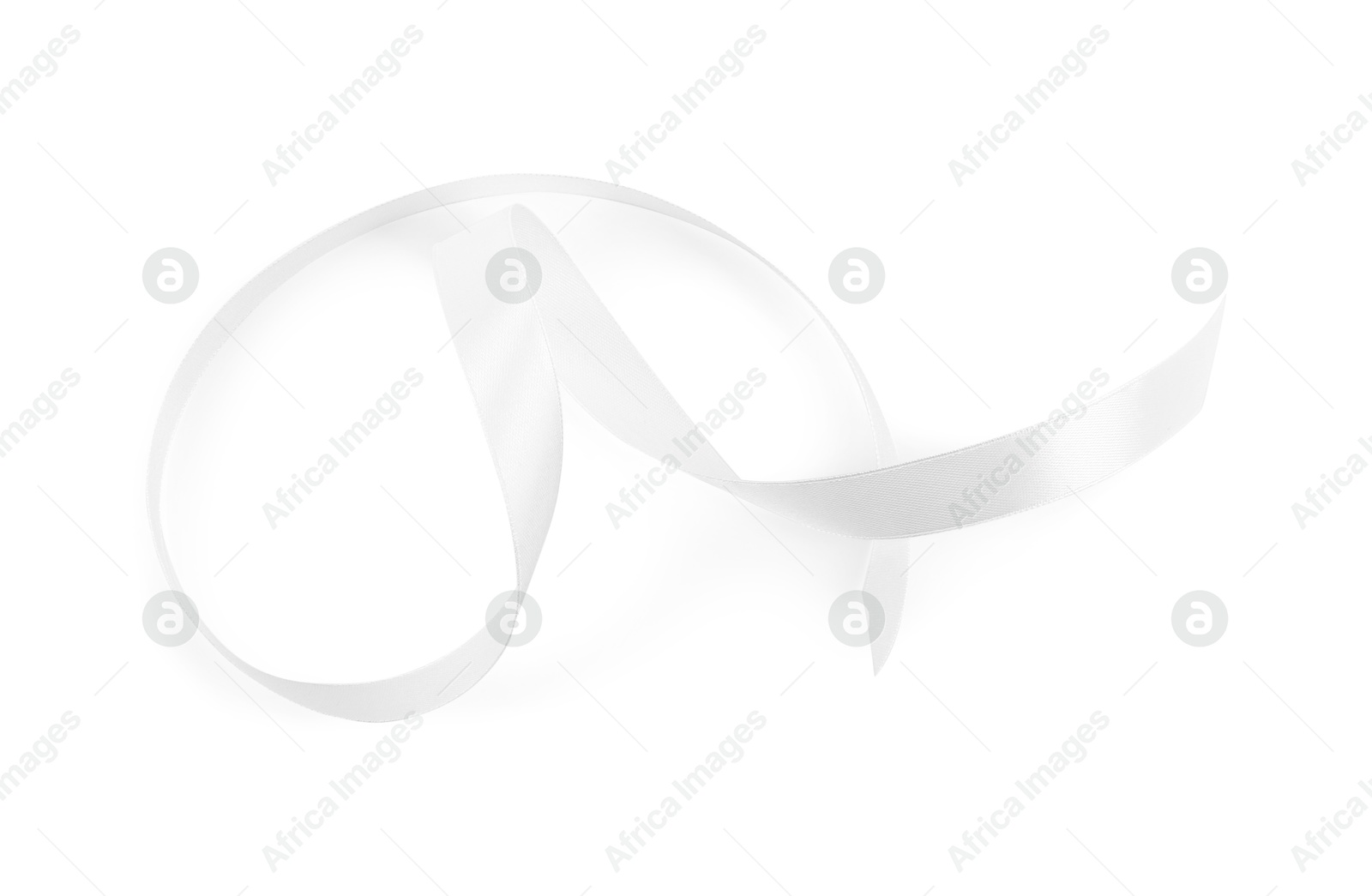 Photo of One beautiful silk ribbon isolated on white, top view