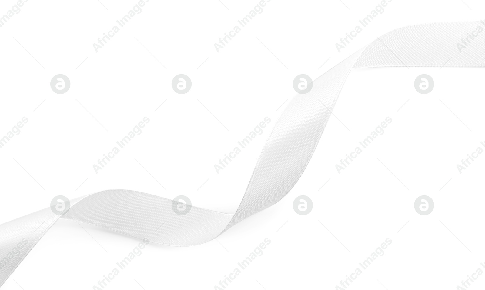 Photo of One beautiful silk ribbon isolated on white, top view