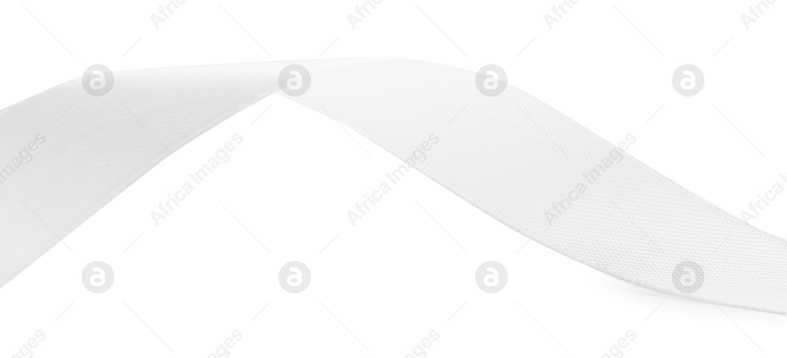 Photo of One beautiful silk ribbon isolated on white