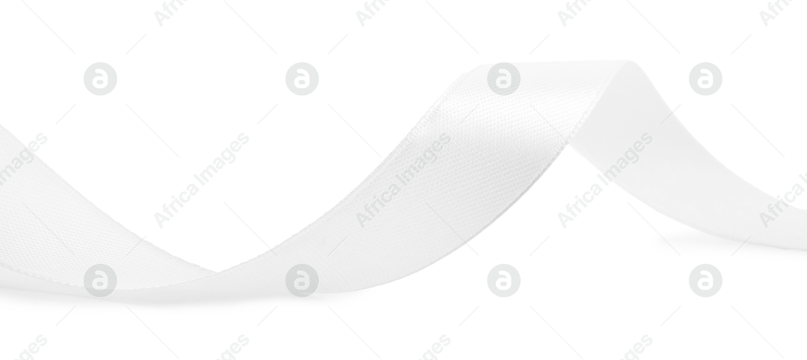 Photo of One beautiful silk ribbon isolated on white