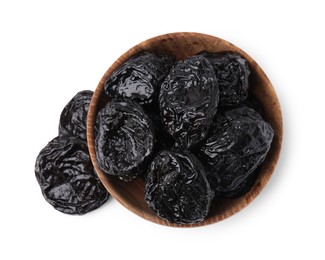 Tasty dried plums (prunes) in bowl on white background, top view