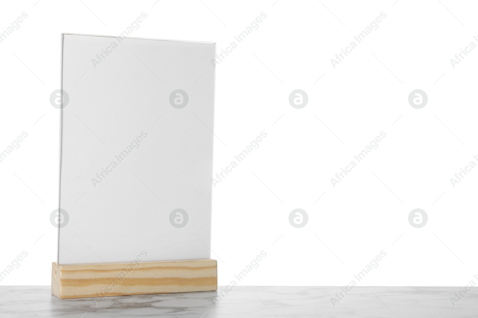 Photo of Menu holder on marble table against white background. Space for text