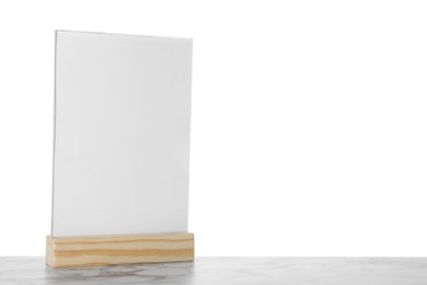 Photo of Menu holder on marble table against white background. Space for text