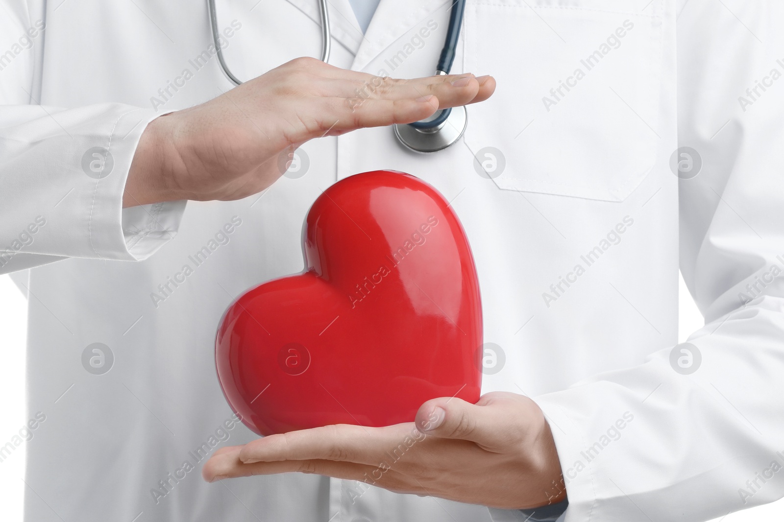 Photo of Doctor with red heart isolated on white, closeup