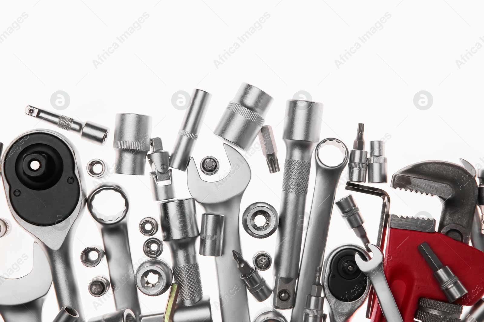 Photo of Set of auto mechanic's tools on white background, flat lay