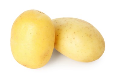 Photo of Two young fresh potatoes isolated on white