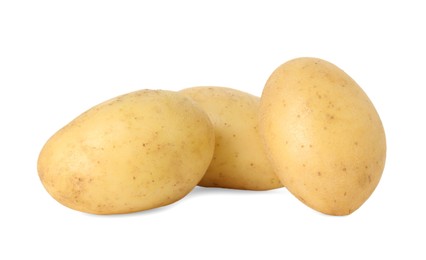 Photo of Three young fresh potatoes isolated on white