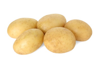 Photo of Pile of young fresh potatoes isolated on white