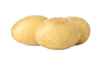 Photo of Three young fresh potatoes isolated on white