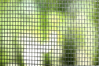 Photo of Insect screen for window against blurred background, closeup