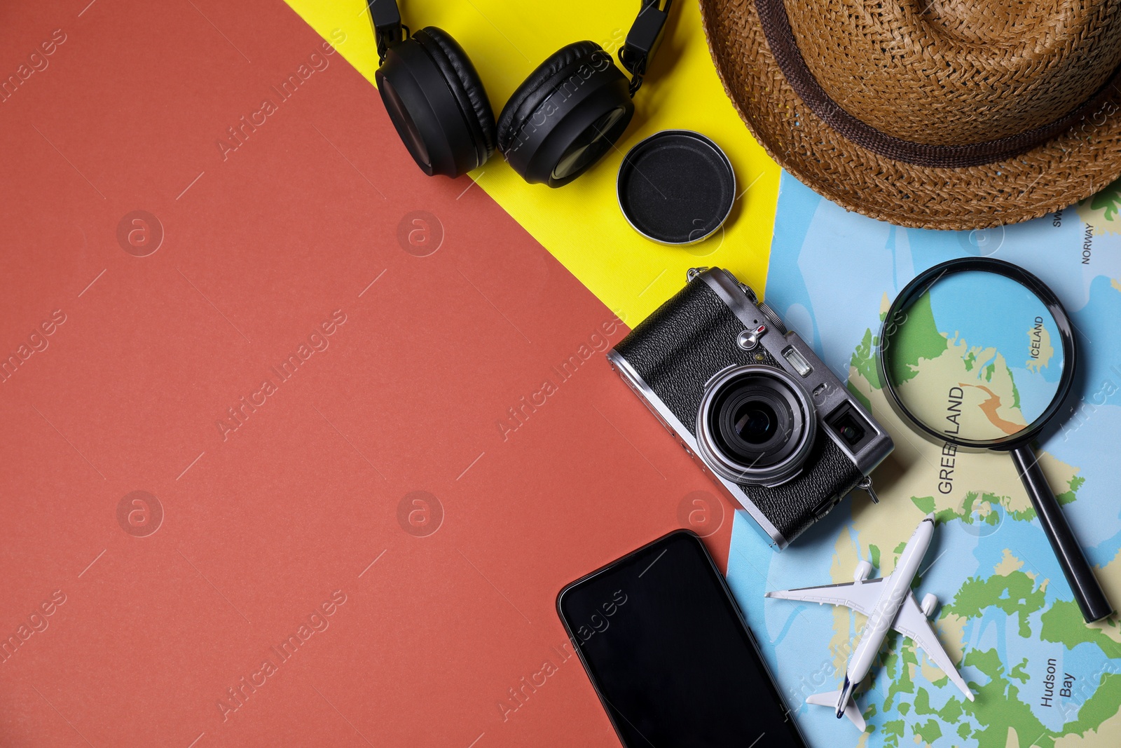 Photo of Flat lay composition with travel blogger`s items on color background