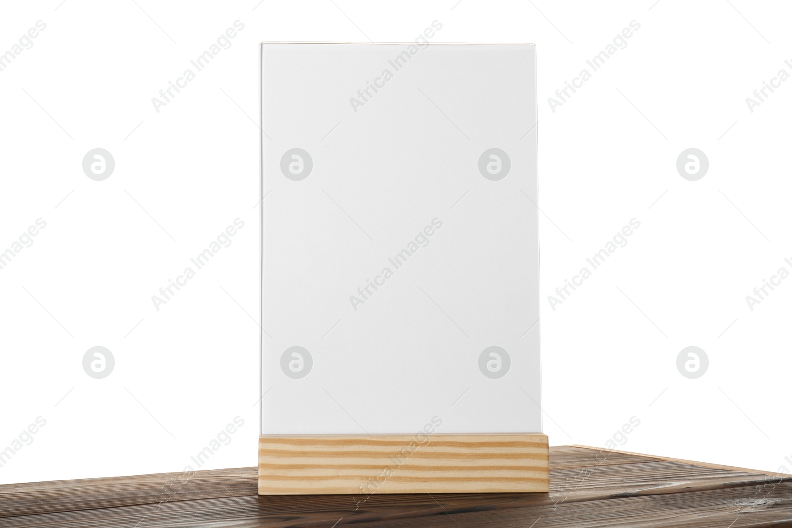 Photo of Menu holder on wooden table against white background. Mockup for design