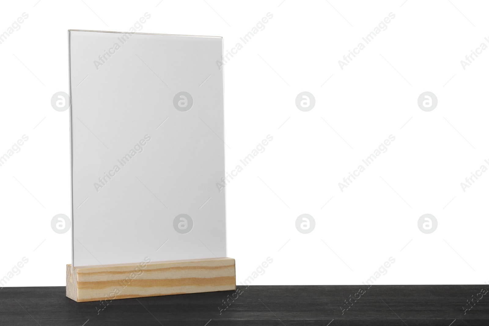 Photo of Menu holder on black wooden table against white background. Space for text