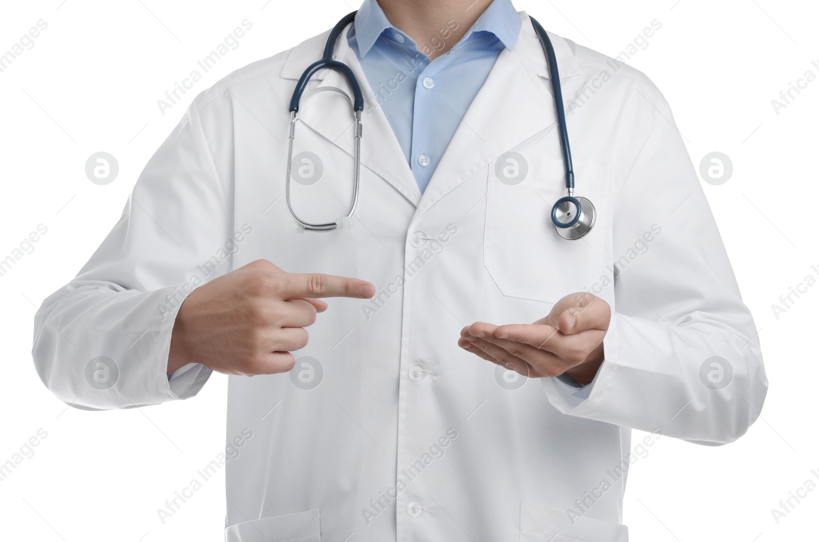 Photo of Doctor pointing at something on white background, closeup