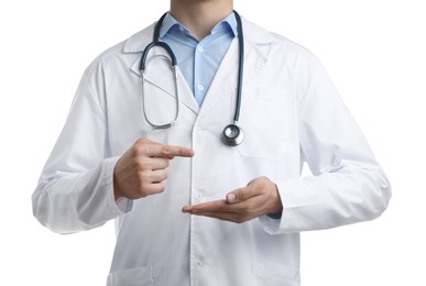 Photo of Doctor pointing at something on white background, closeup