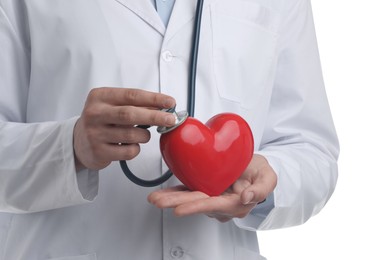 Photo of Doctor with stethoscope and red heart isolated on white, closeup