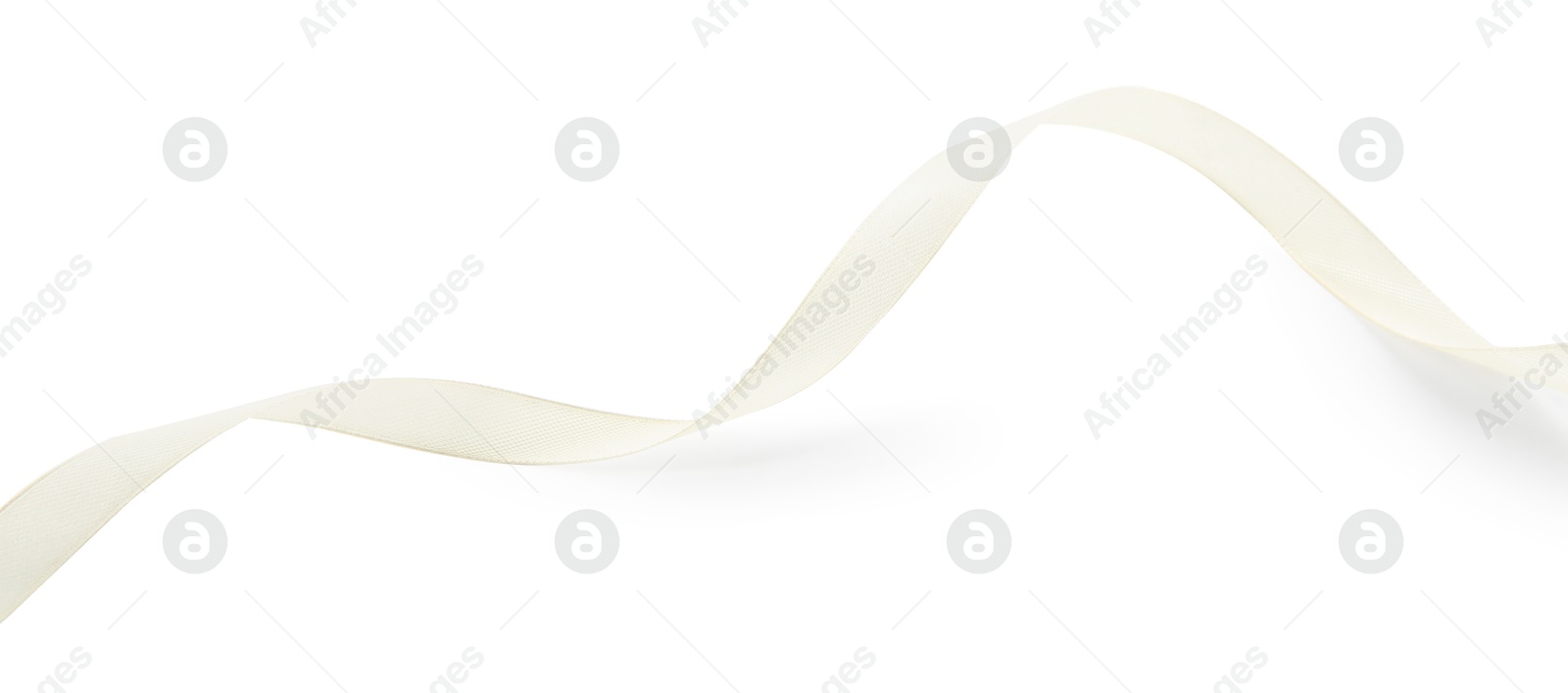 Photo of One beautiful beige ribbon isolated on white