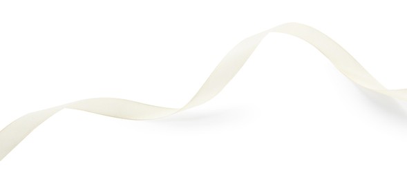 Photo of One beautiful beige ribbon isolated on white