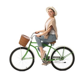 Photo of Smiling woman riding bicycle with basket on white background
