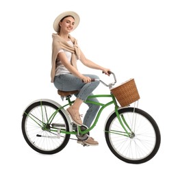 Photo of Smiling woman on bicycle with basket against white background