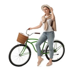 Photo of Beautiful young woman with bicycle against white background