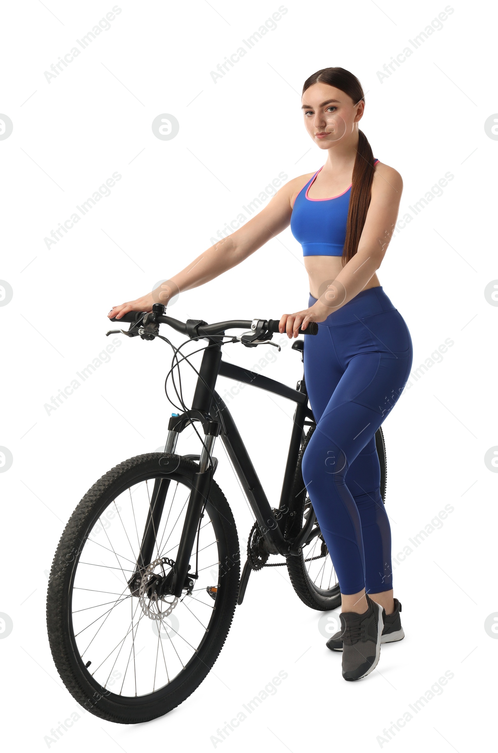 Photo of Beautiful young woman with bicycle isolated on white