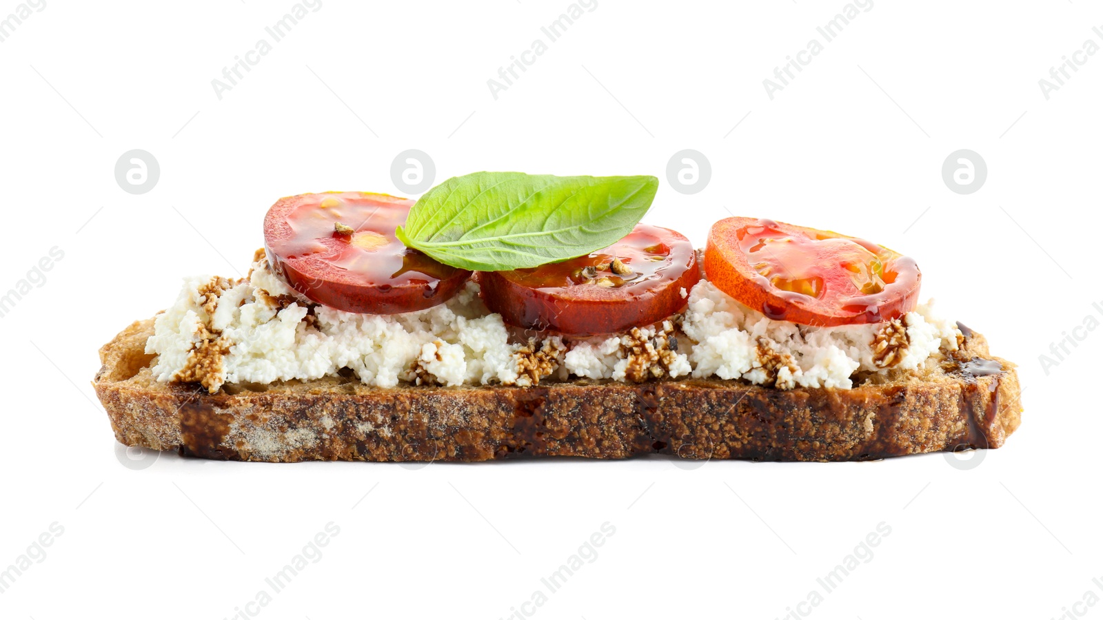 Photo of Delicious ricotta bruschetta with tomatoes, basil and sauce isolated on white