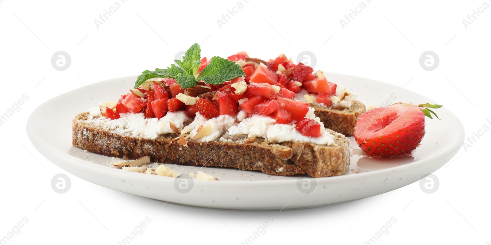 Photo of Delicious bruschettas with ricotta cheese, chopped strawberries and mint isolated on white