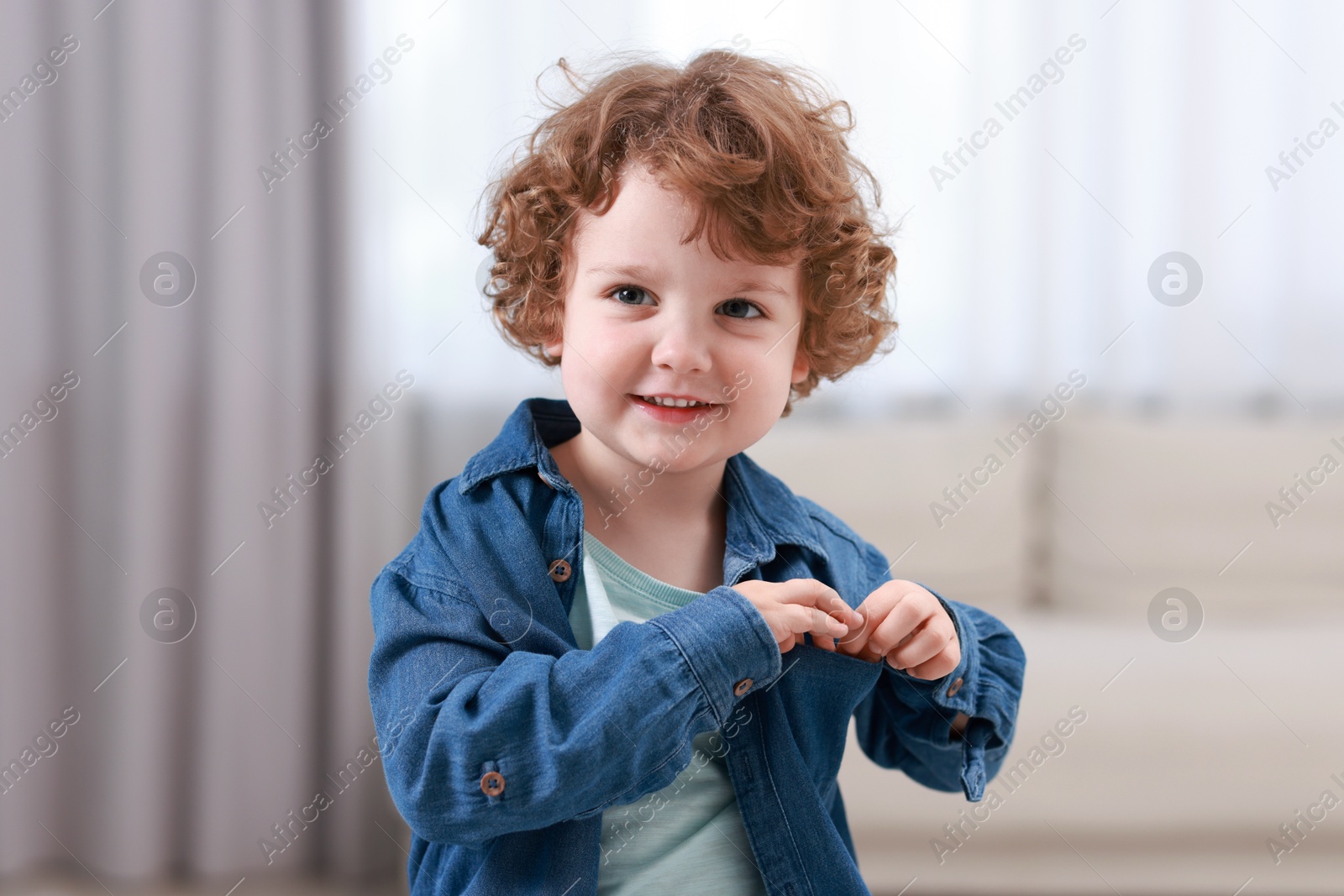 Photo of Portrait of little boy indoors. Cute child