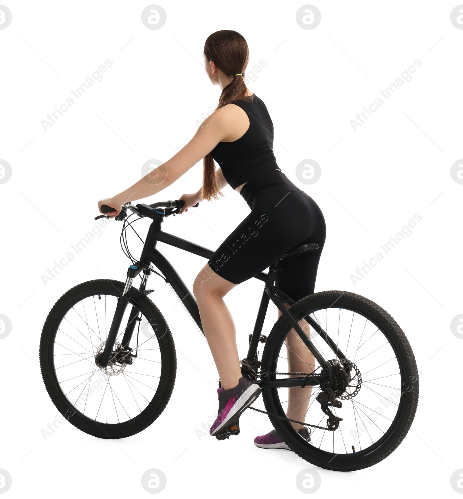 Photo of Woman on sports bicycle against white background
