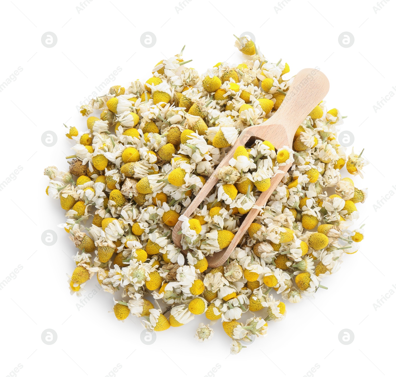 Photo of Pile of chamomile flowers and wooden scoop isolated on white, top view