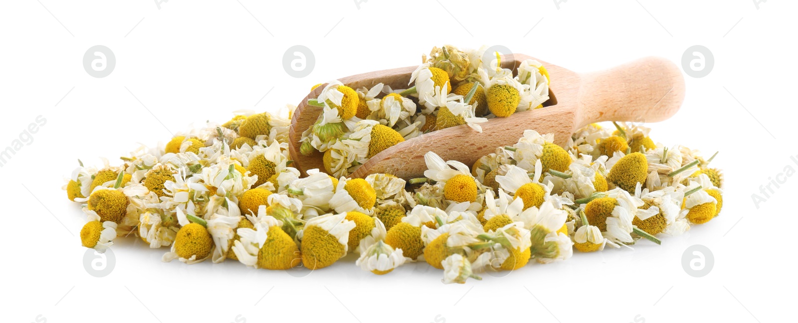 Photo of Pile of chamomile flowers and wooden scoop isolated on white