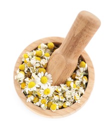 Photo of Dry and fresh chamomile flowers in mortar isolated on white, top view