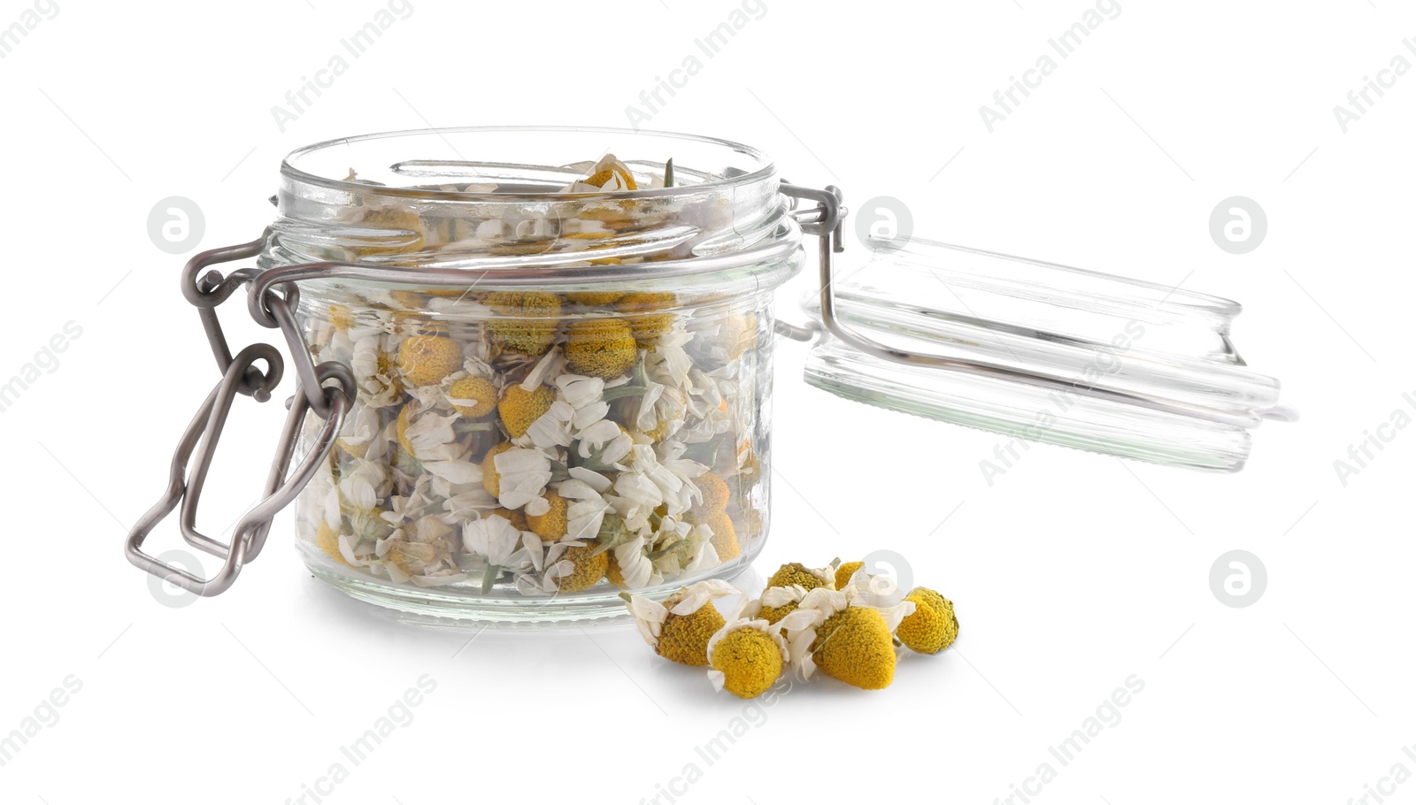 Photo of Chamomile flowers in glass jar isolated on white