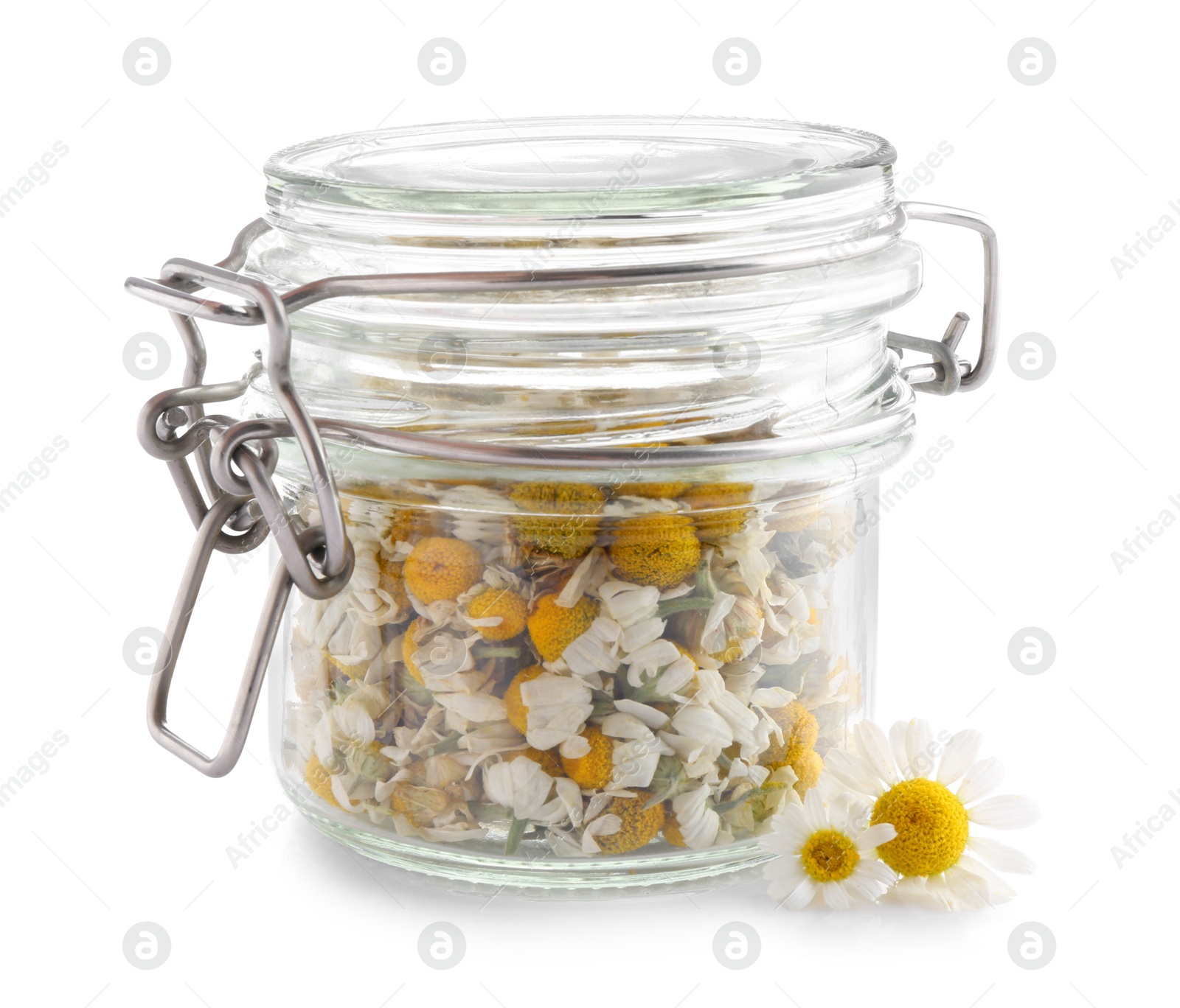 Photo of Dry and fresh chamomile flowers in glass jar isolated on white