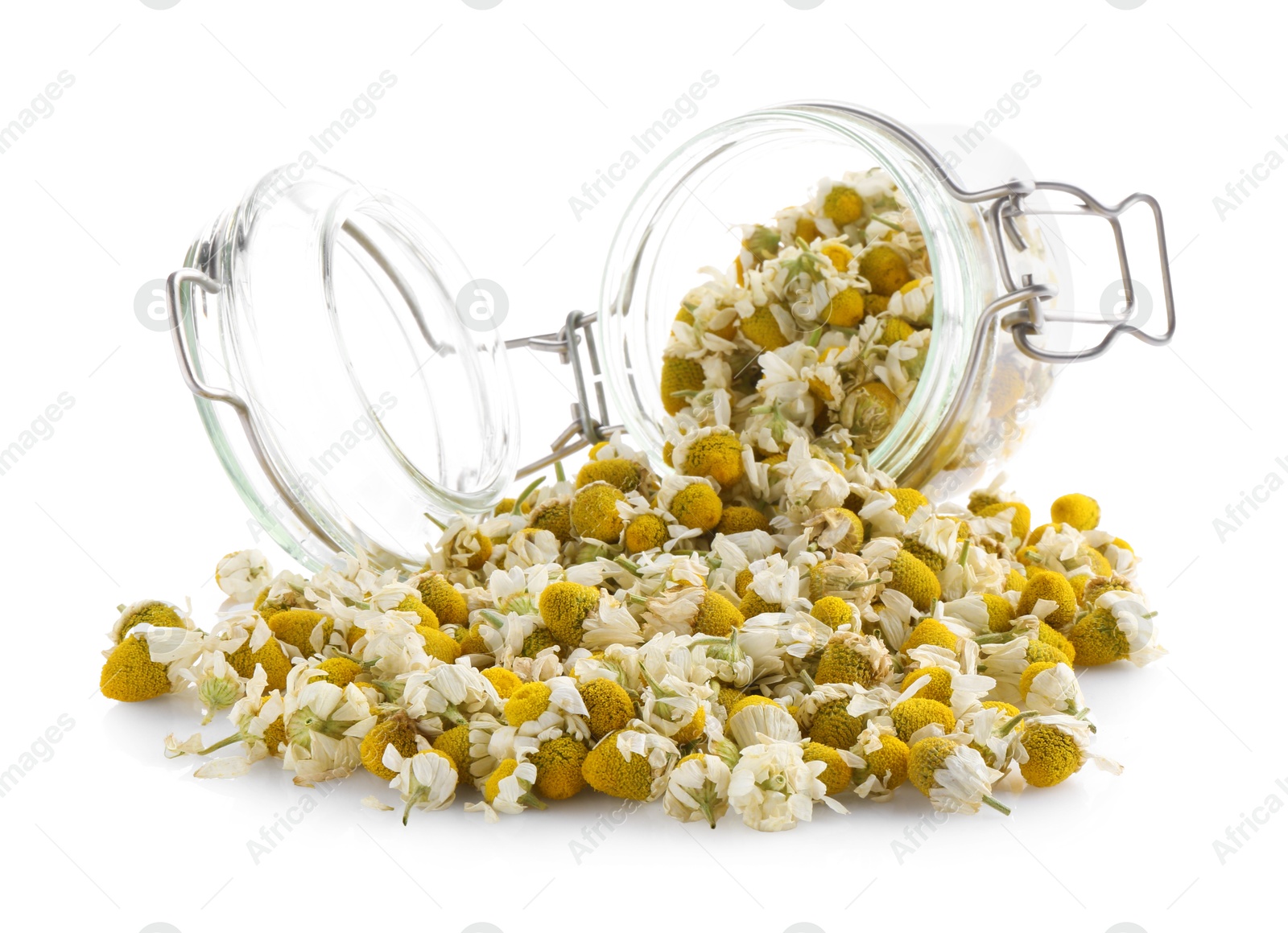 Photo of Chamomile flowers and glass jar isolated on white