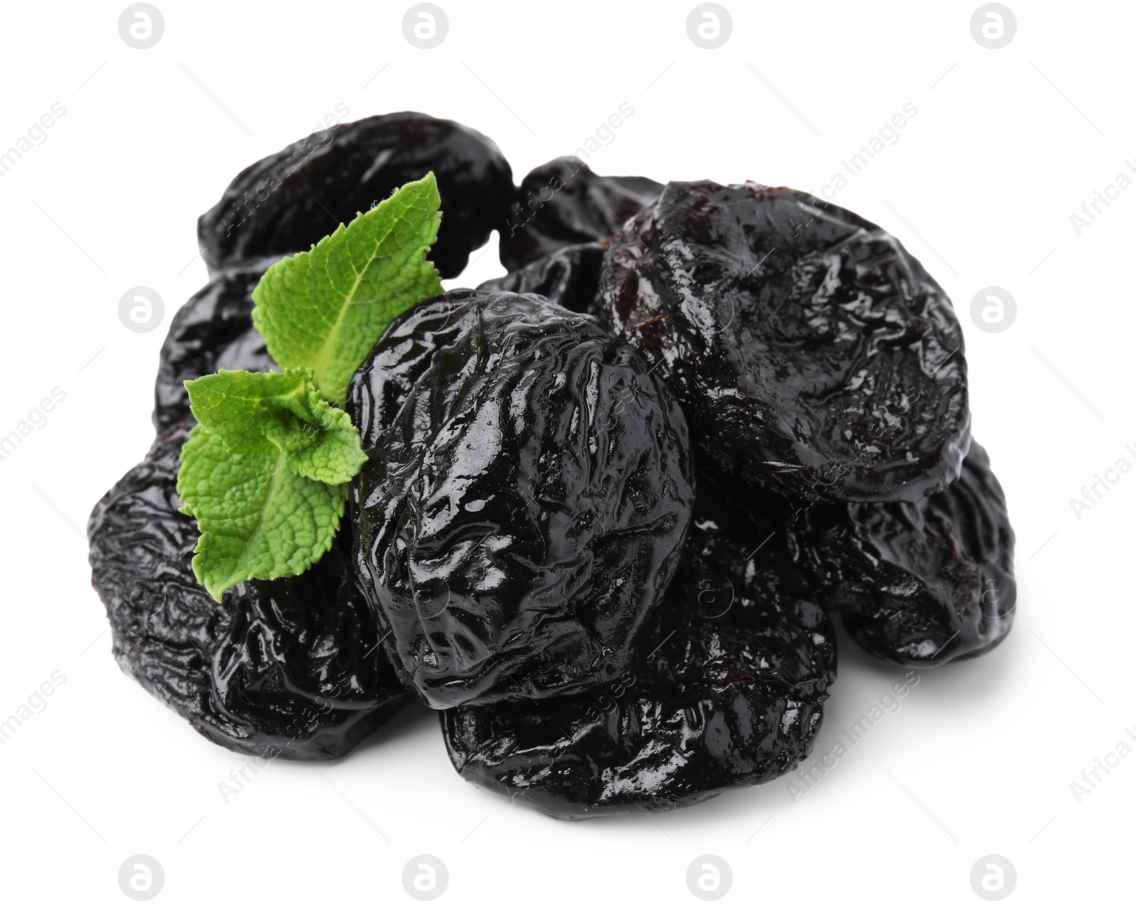 Photo of Tasty dried plums (prunes) and mint leaves on white background