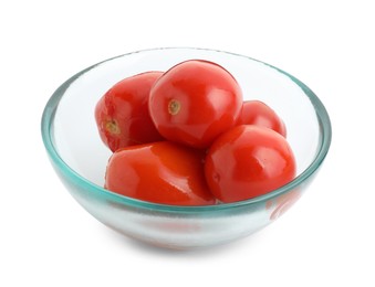 Photo of Tasty pickled tomatoes in bowl isolated on white