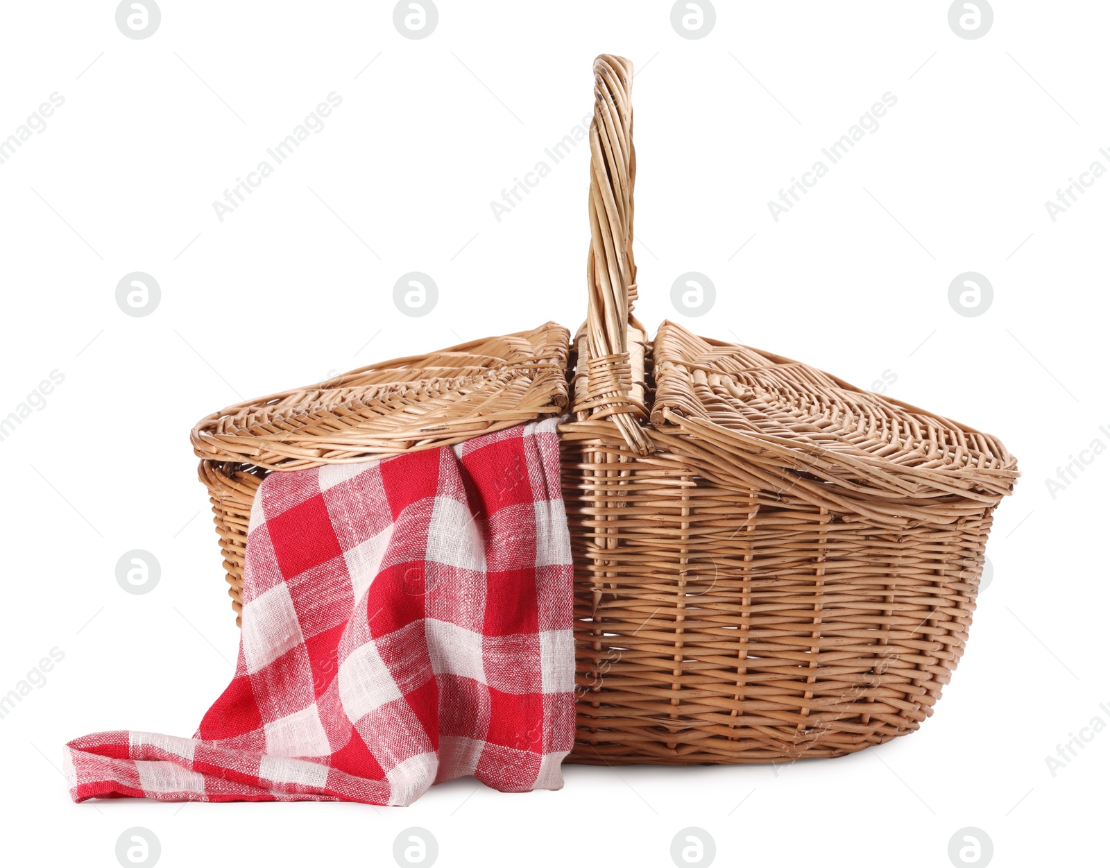 Photo of One picnic wicker basket with checkered napkin isolated on white