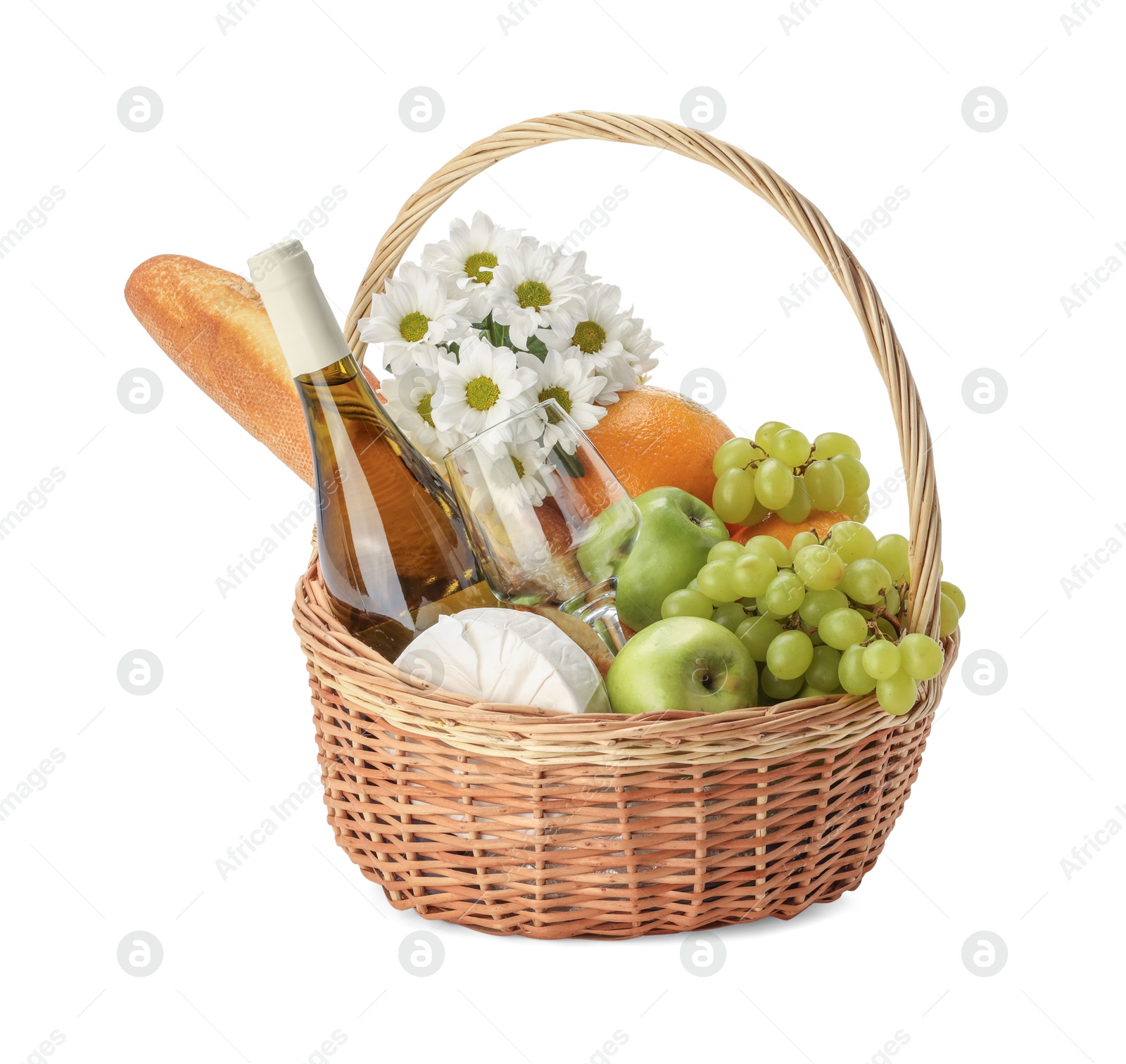 Photo of Picnic basket with flowers, food and wine isolated on white