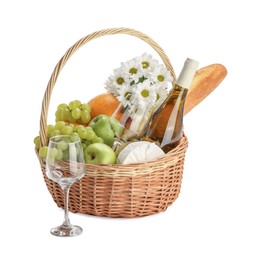 Photo of Picnic basket with flowers, food and wine isolated on white