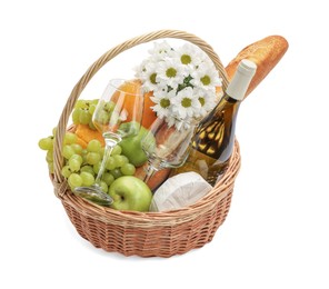 Photo of Picnic basket with flowers, food and wine isolated on white