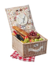 Photo of Picnic basket with tableware, food and wine isolated on white