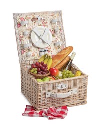 Photo of Picnic basket with tableware, food and wine isolated on white