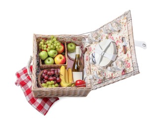 Photo of Picnic basket with tableware, food and wine isolated on white, above view